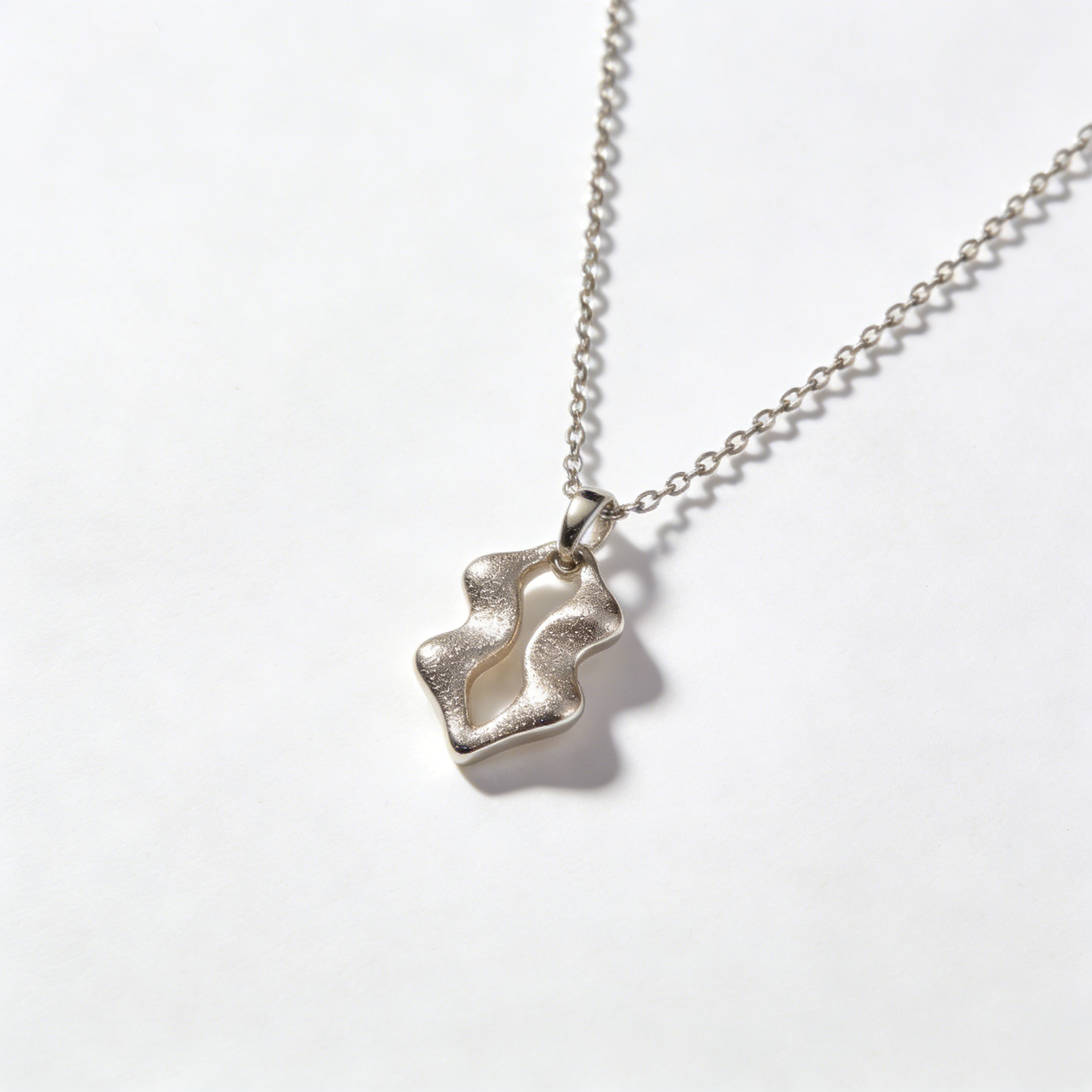 Abstract Irregular Cutout Silver Necklace